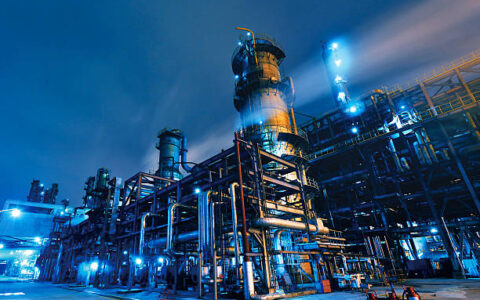 Oil Refinery, Chemical & Petrochemical plant abstract at night.